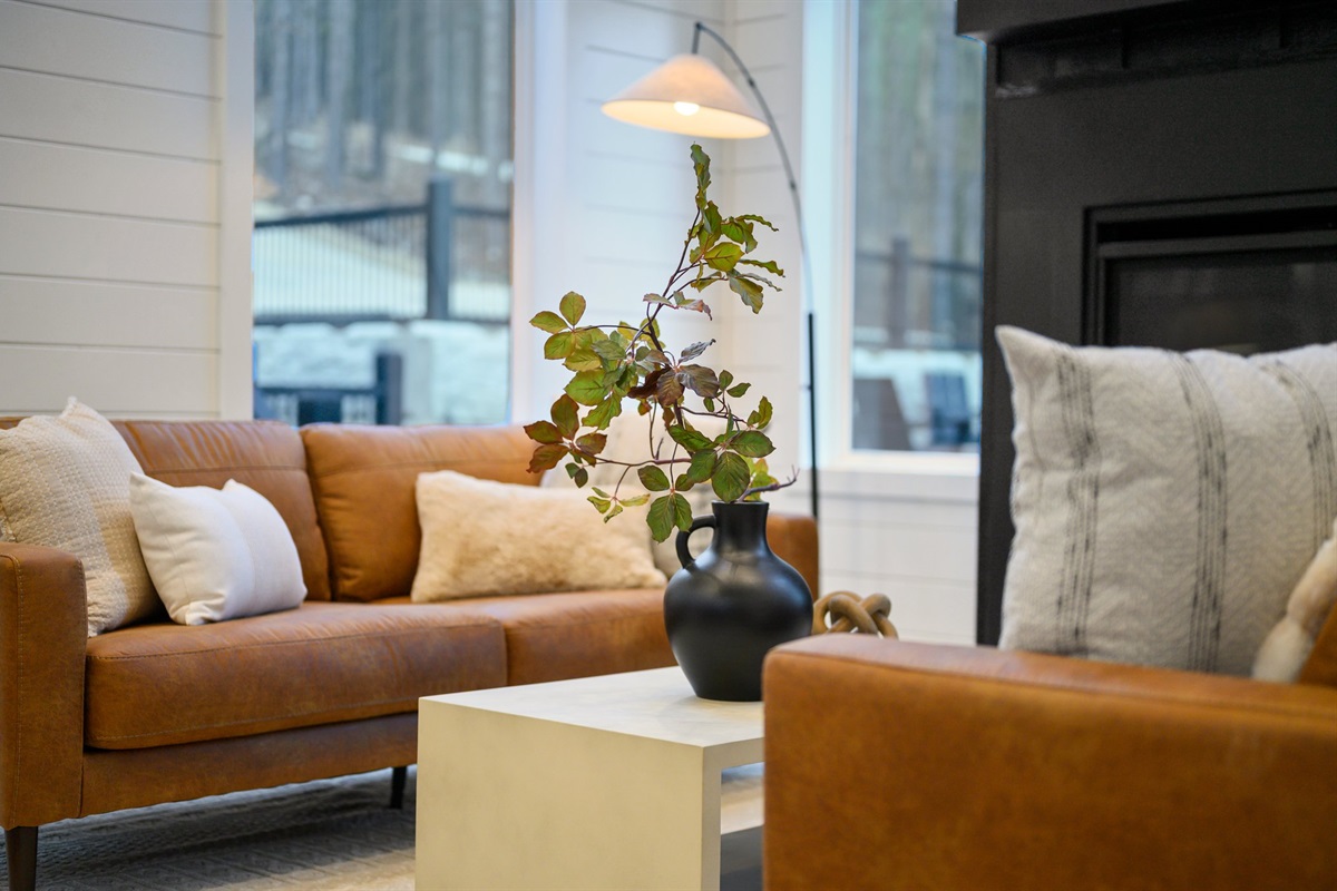 The open-concept living, dining, and kitchen area is perfect for relaxing and reconnecting.