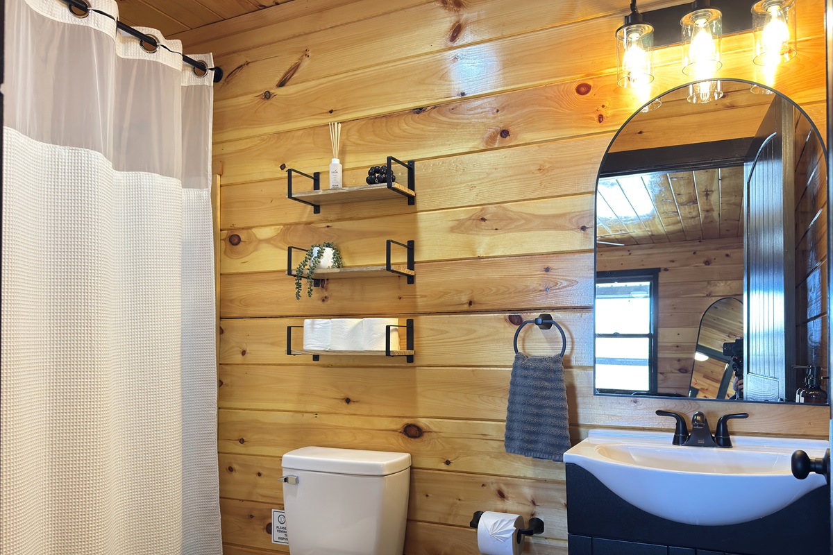 Bathroom attached to first floor king bedroom