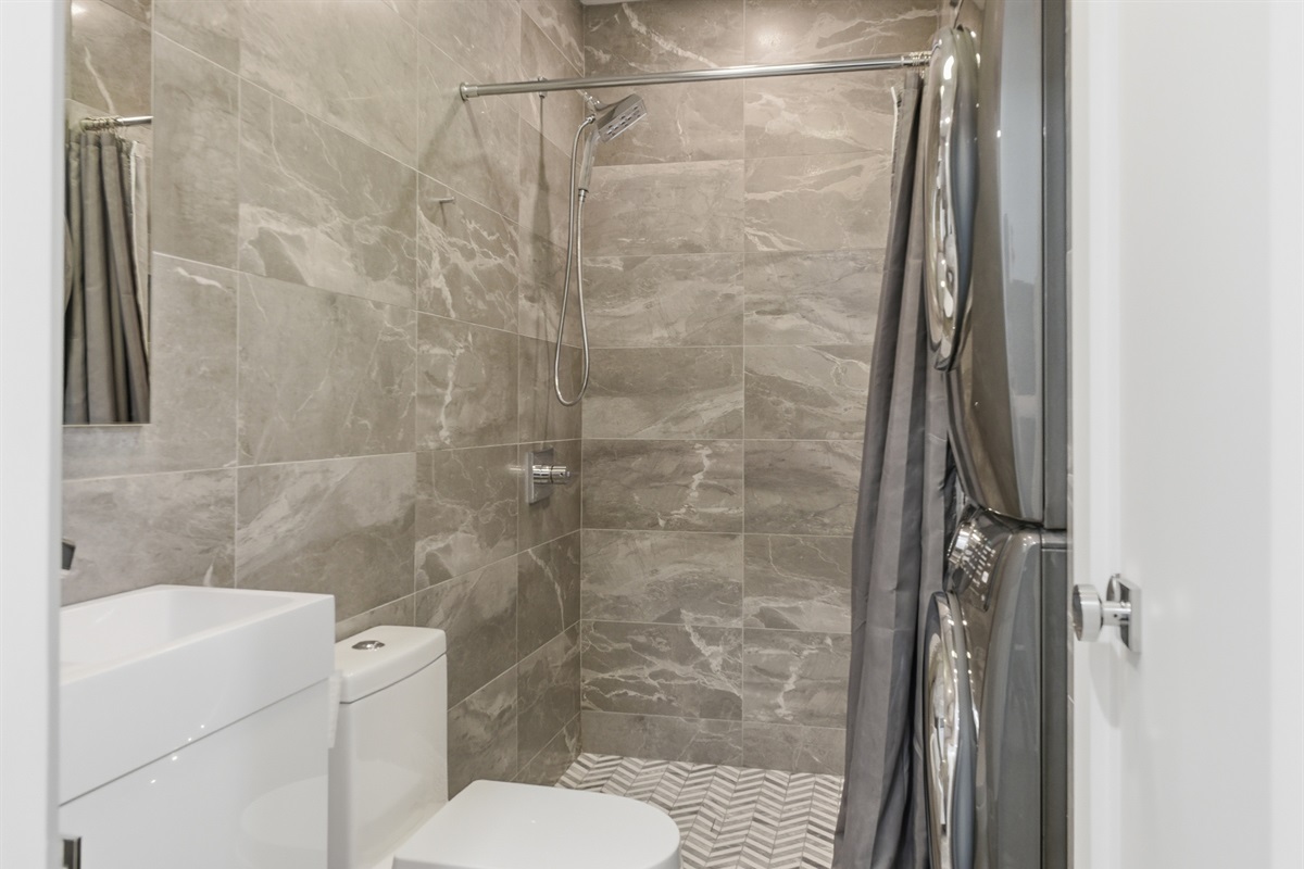 Hallway Bath - Laundry Stacked Washer and Dryer