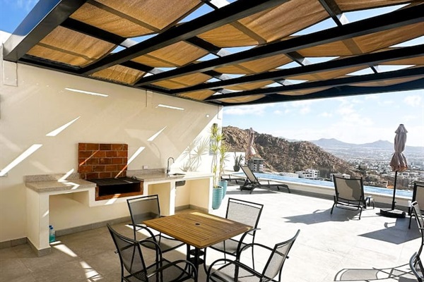 Outdoor kitchen and dining.