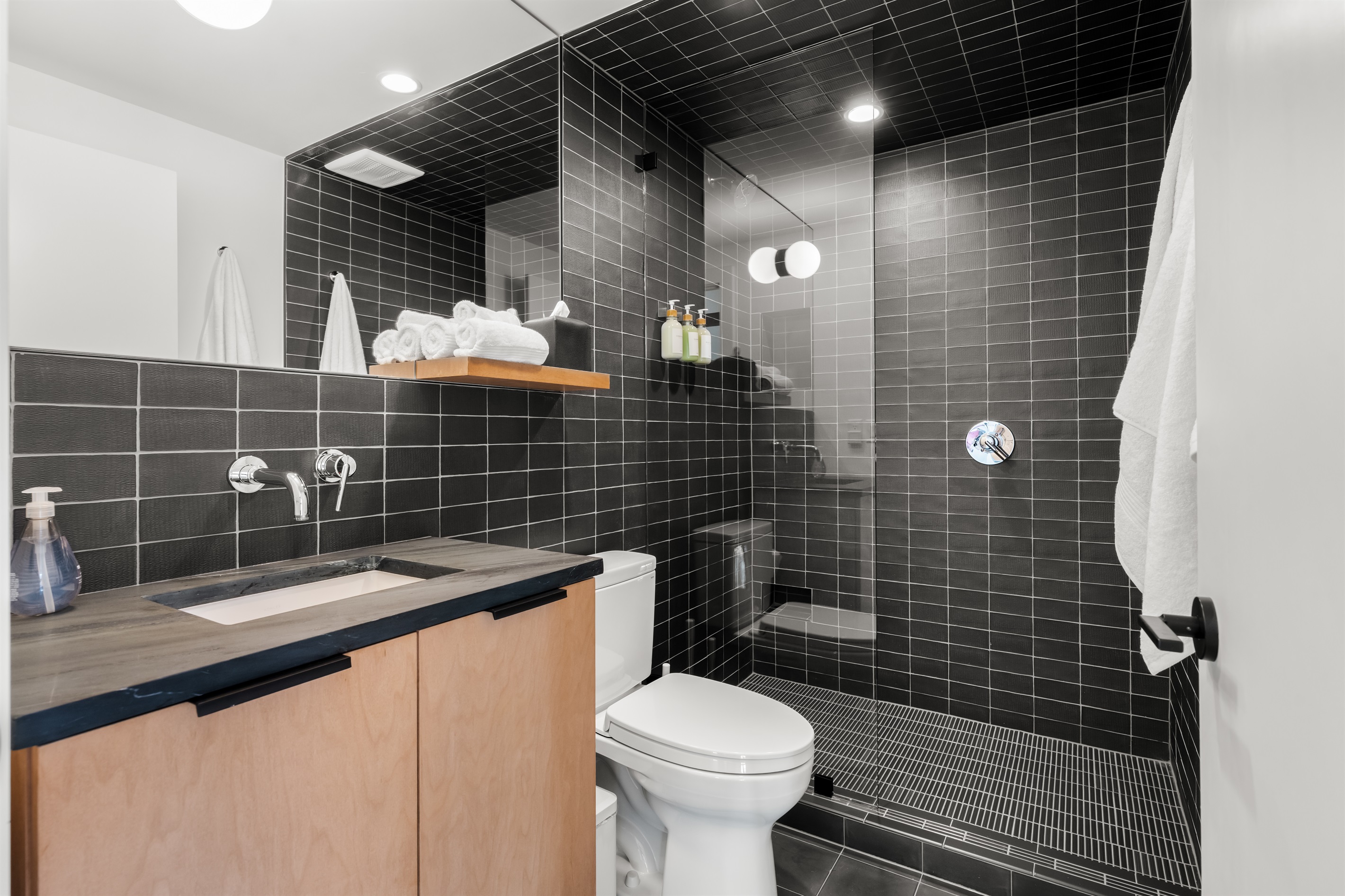 Modern bathroom with a walk-in shower, contemporary finishes, and spa-like details—clean, stylish, and thoughtfully designed for a refreshing start or end to your day.