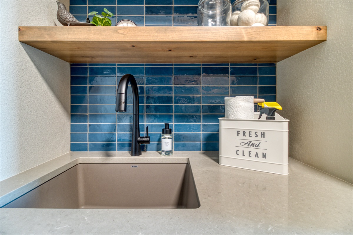 Laundry room stocked with essentials to keep your vacation stress free.