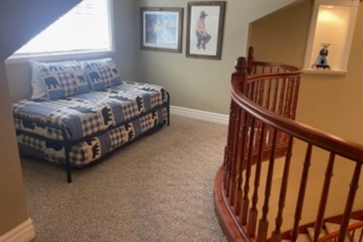 Twin bed and twin trundle in the loft area