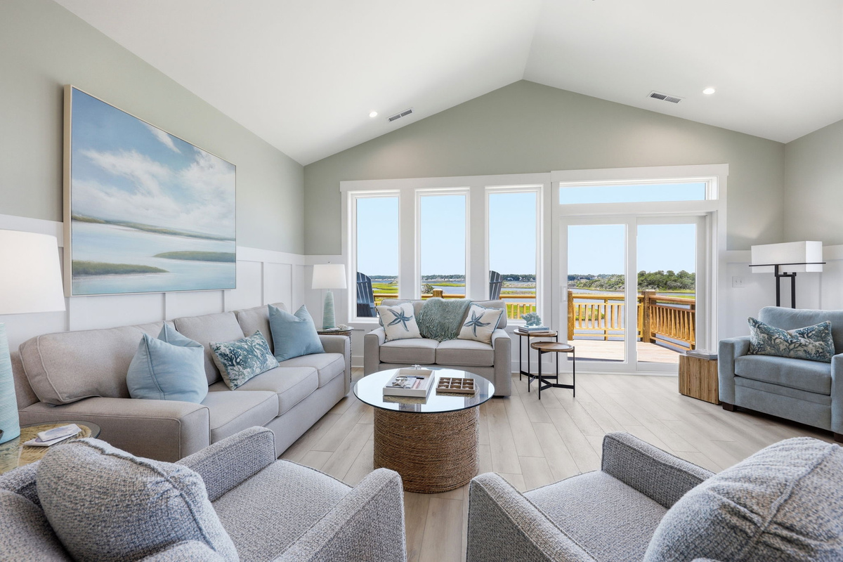 Natural light and sweeping sound views make this the perfect place to unwind together