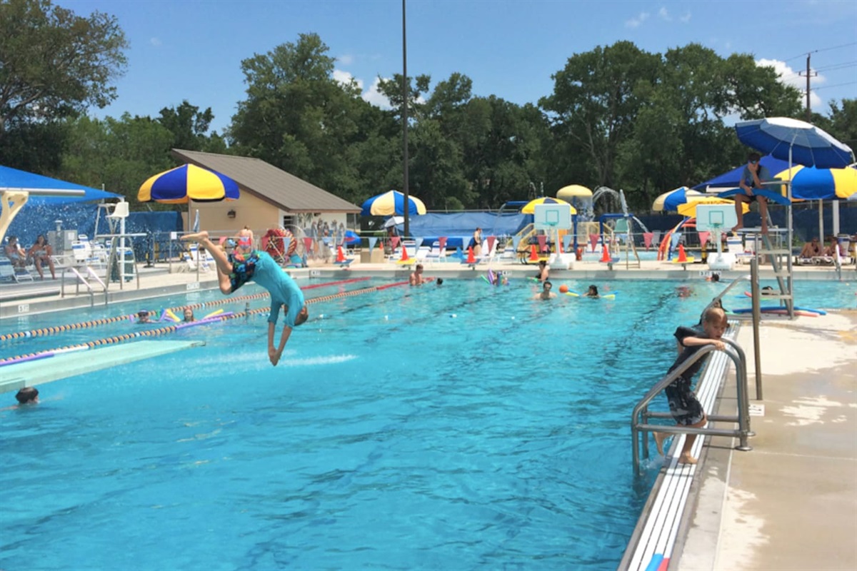 This Community Pool Is Located Five Minutes from The House.  It Features Lap Swimming, Dive Boards,  A Beach End, And A Splash Pad In Summer Months.  Open Year Round and Heated in Winter Months.  Fee For Entry