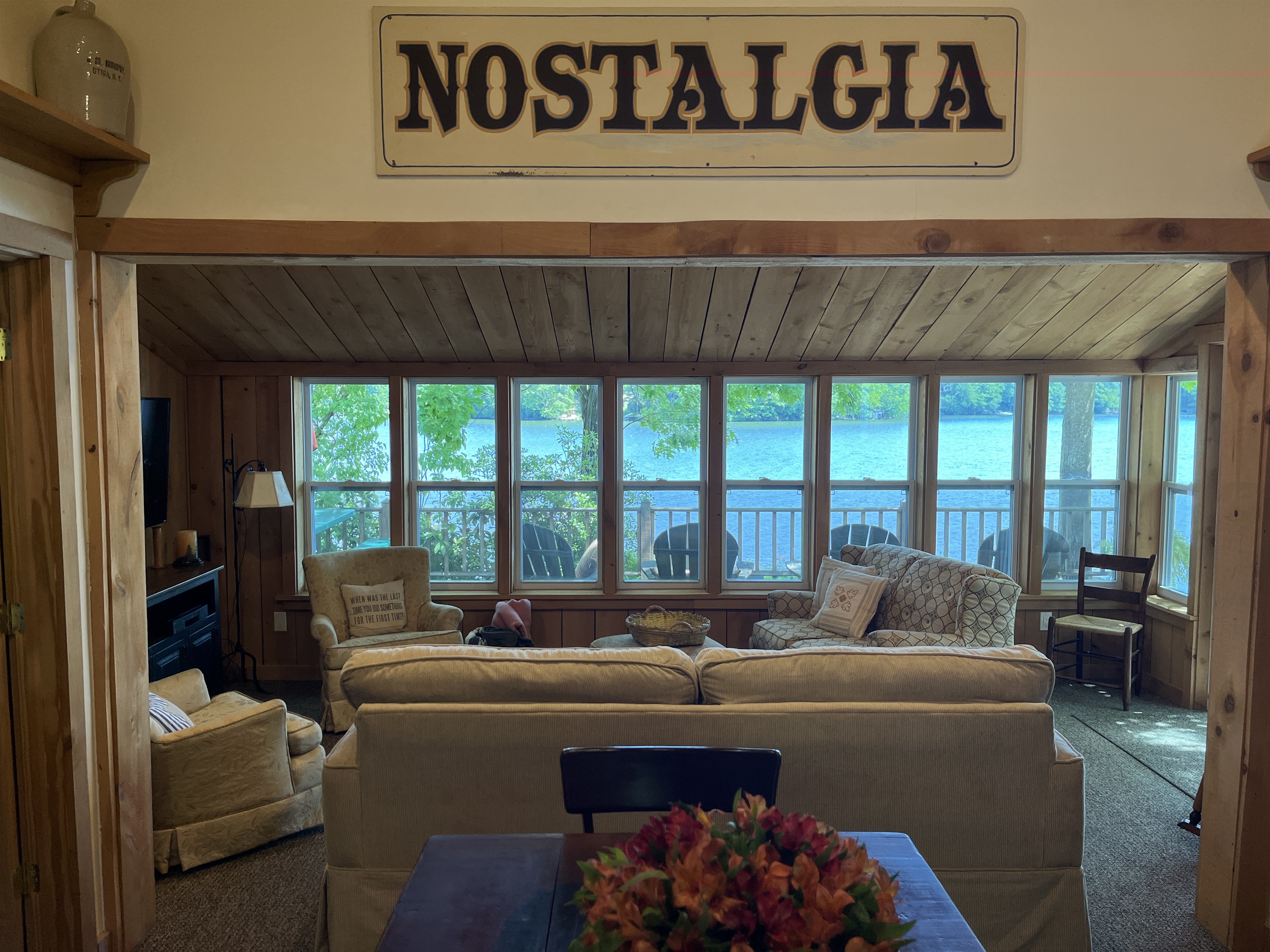 Dining area and living room overlooking the water