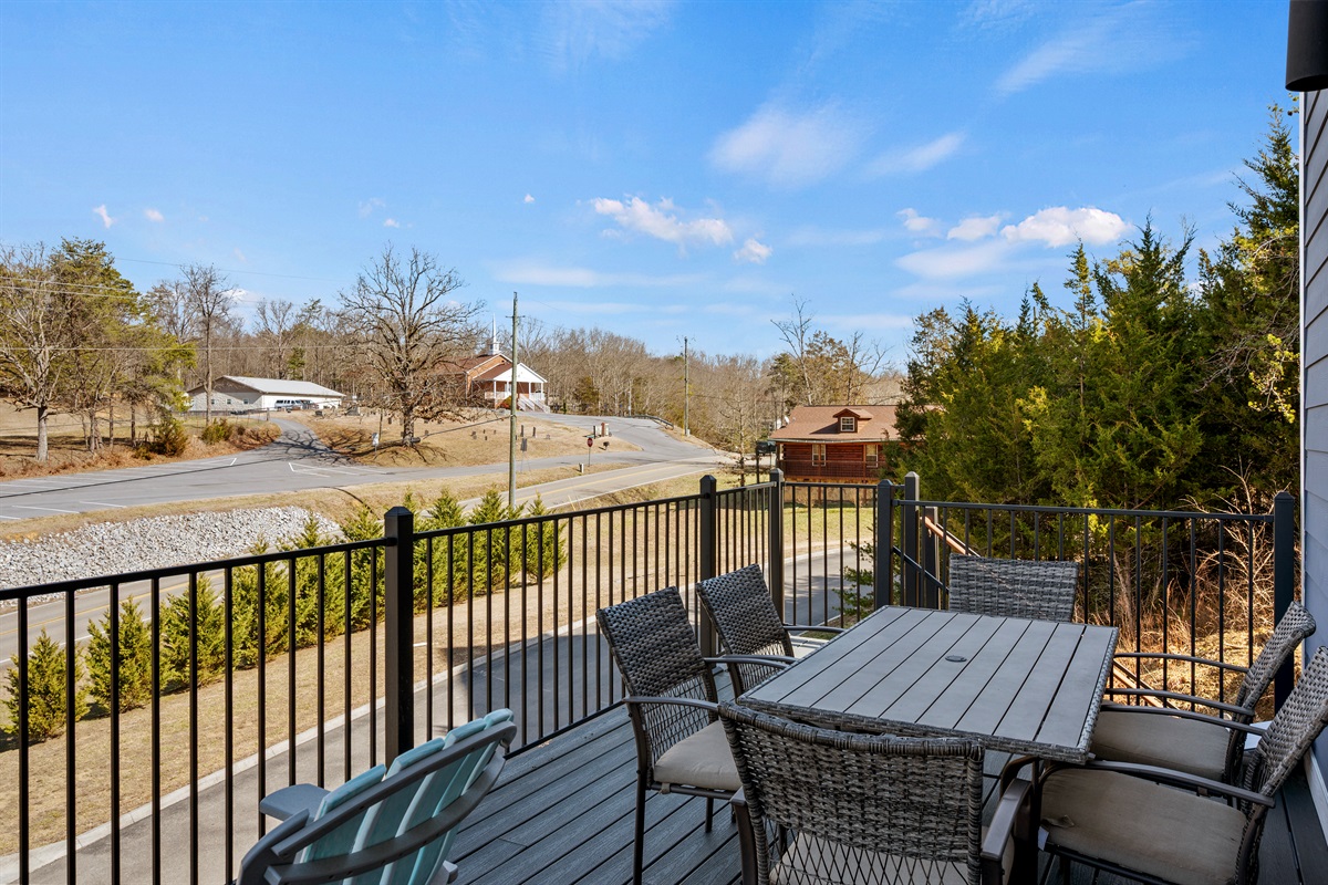 Private deck with outdoor seating—perfect for morning coffee, evening conversations, or enjoying the peaceful surroundings.