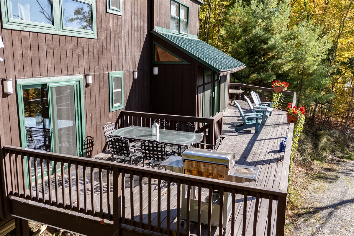 Deck view showing table and chairs ready for an alfresco meal outdoors