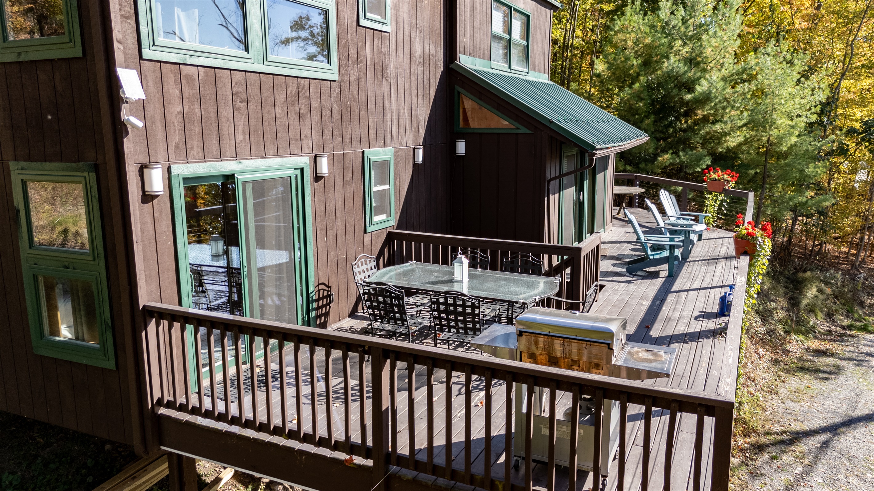 Deck view showing table and chairs ready for an alfresco meal outdoors