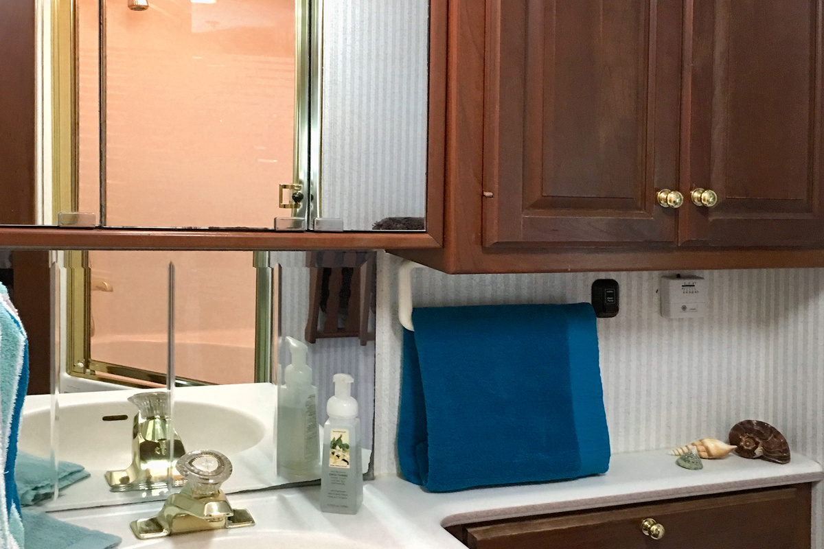 Bathroom Sink, Cabinets and Toilet