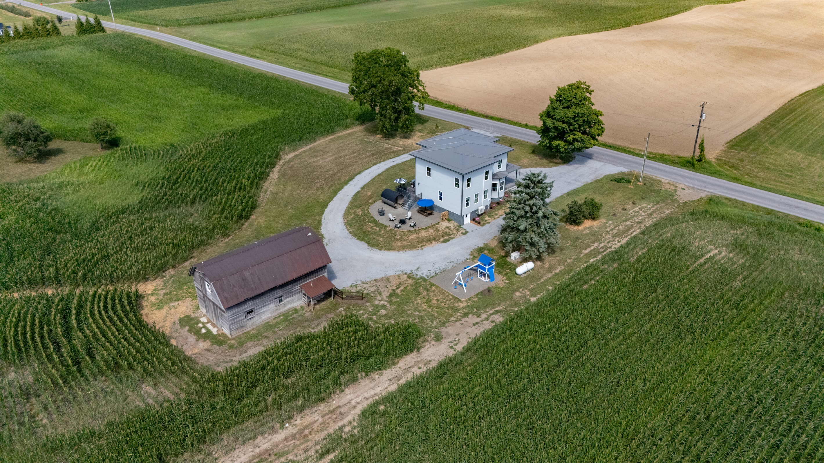 A perfect blend of modern living and rustic charm—updated 1817 home with a barn(off limits to guests) and outdoor space set in lush farmland.