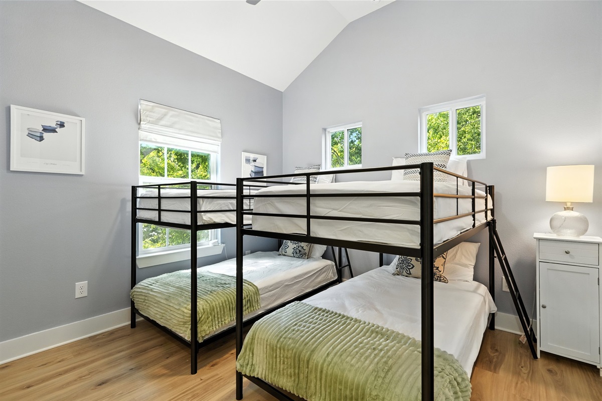 bedroom 3 with 4 single beds