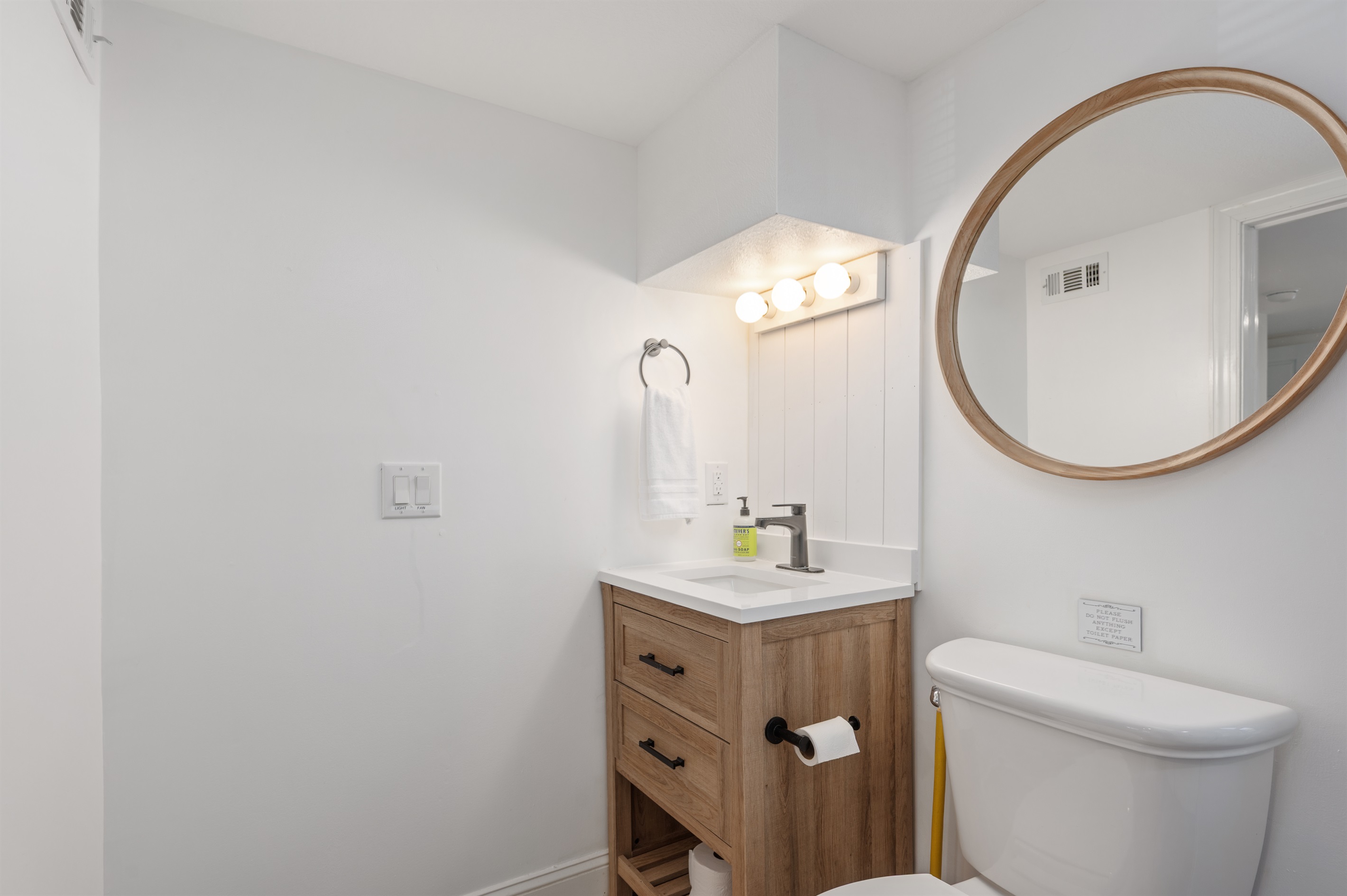 Freshly updated half bath conveniently located on the first floor.
