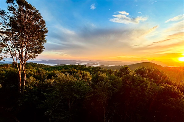 "Of course our favorite place in the home was on the deck watching the sun rise over the mountains with the clouds below." - Chris - July, 2025 - photo courtesy of Chris
