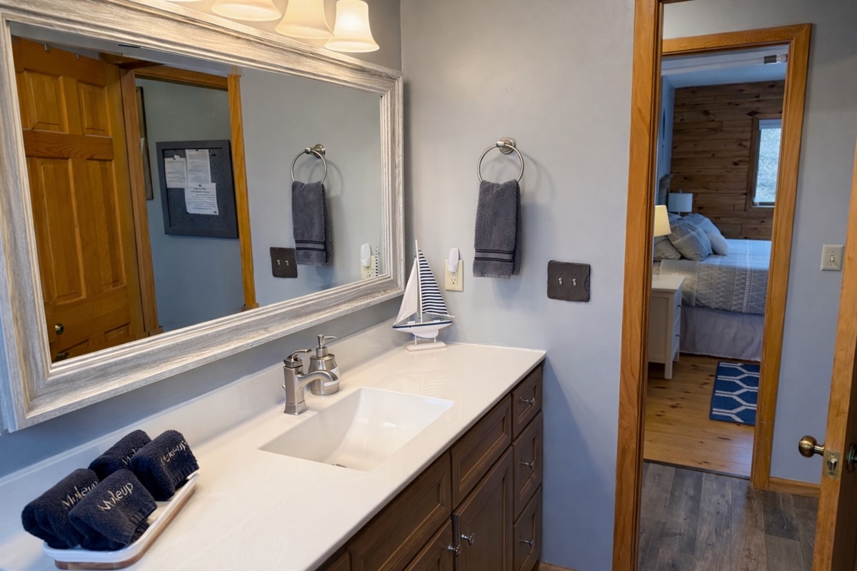 Main floor bathroom conveniently located off the primary bedroom and just steps from the living area, clean, comfortable, and perfectly placed for an easy stay.