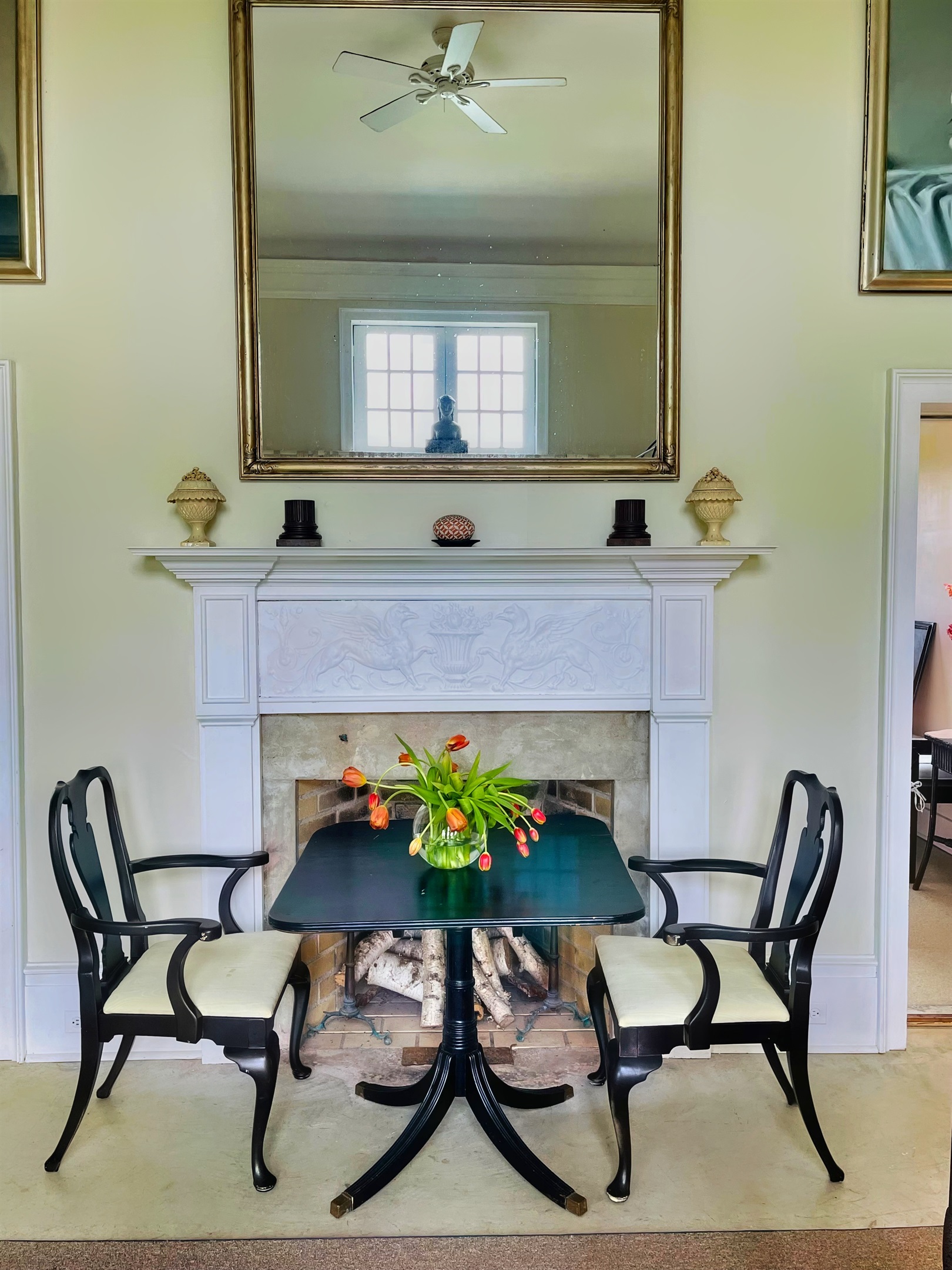 Hawk Field Pool House dining table in the main space with seating for 2.