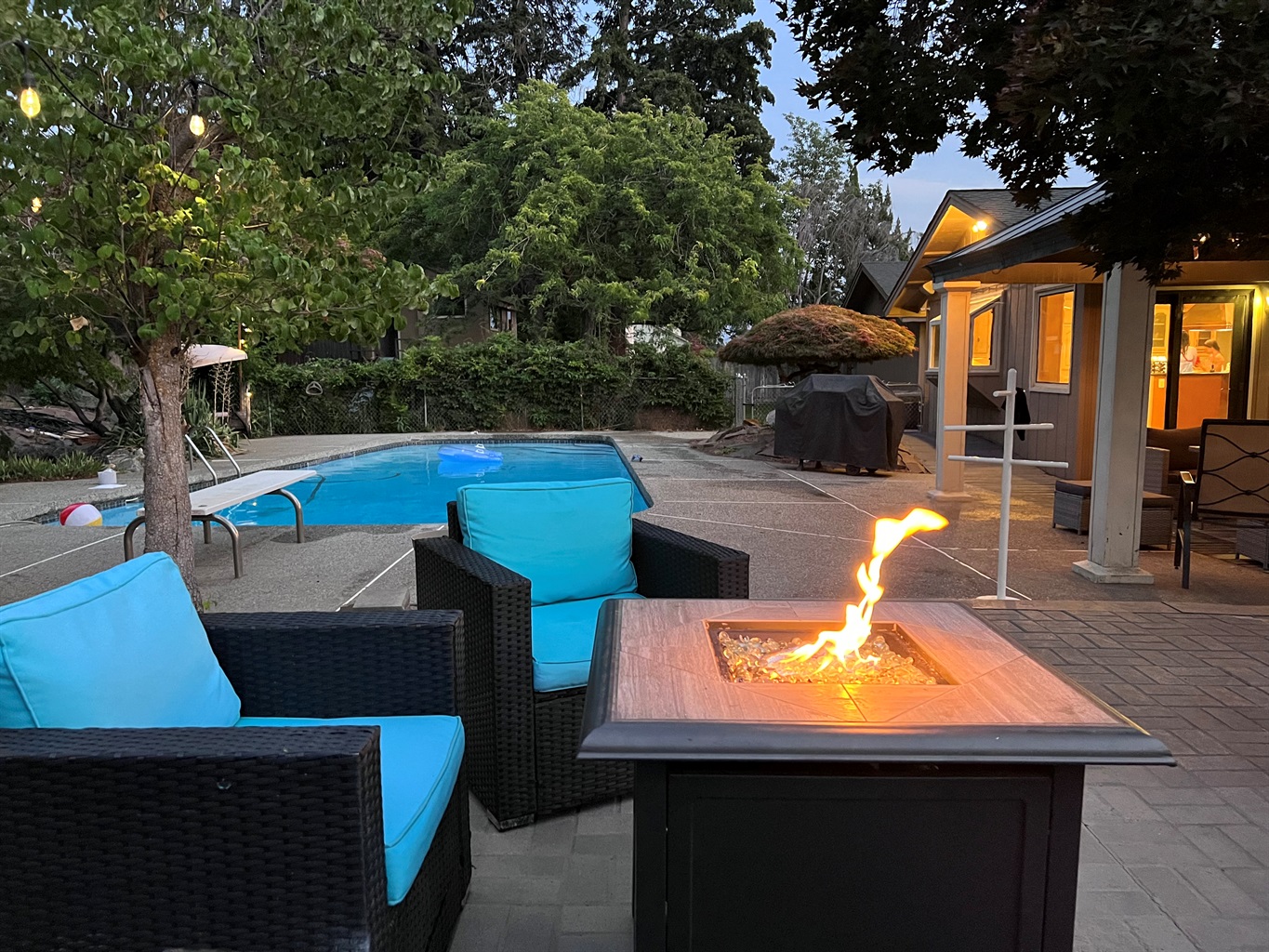 Enjoy the fire pit with family and friends, we have multiple seating areas in our private backyard.