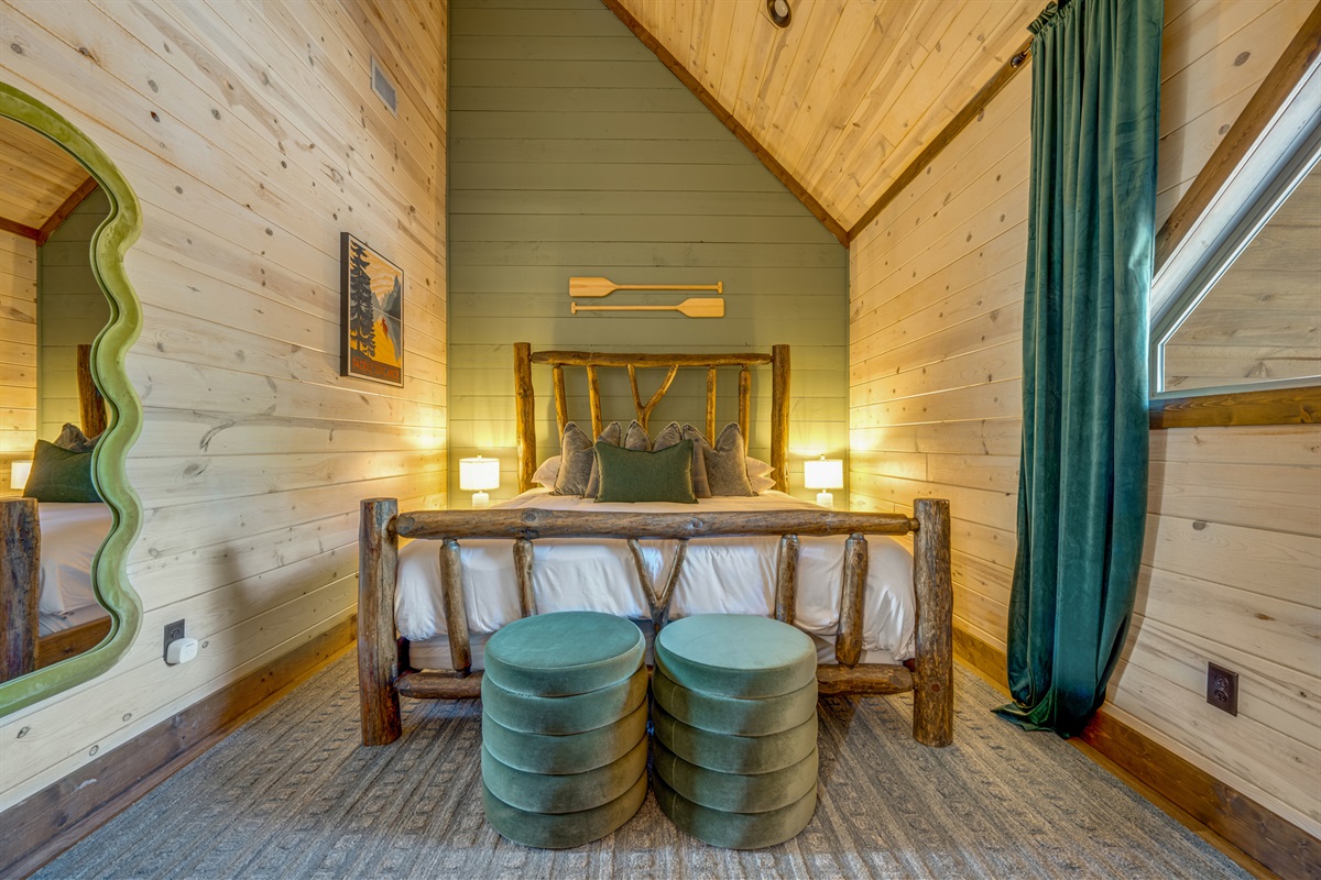 Rustic Retreat: Drift into dreams on a log bed surrounded by charming woodland decor!