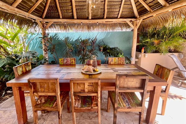 Shady palapa for boat drinks, games, or outdoor dining.