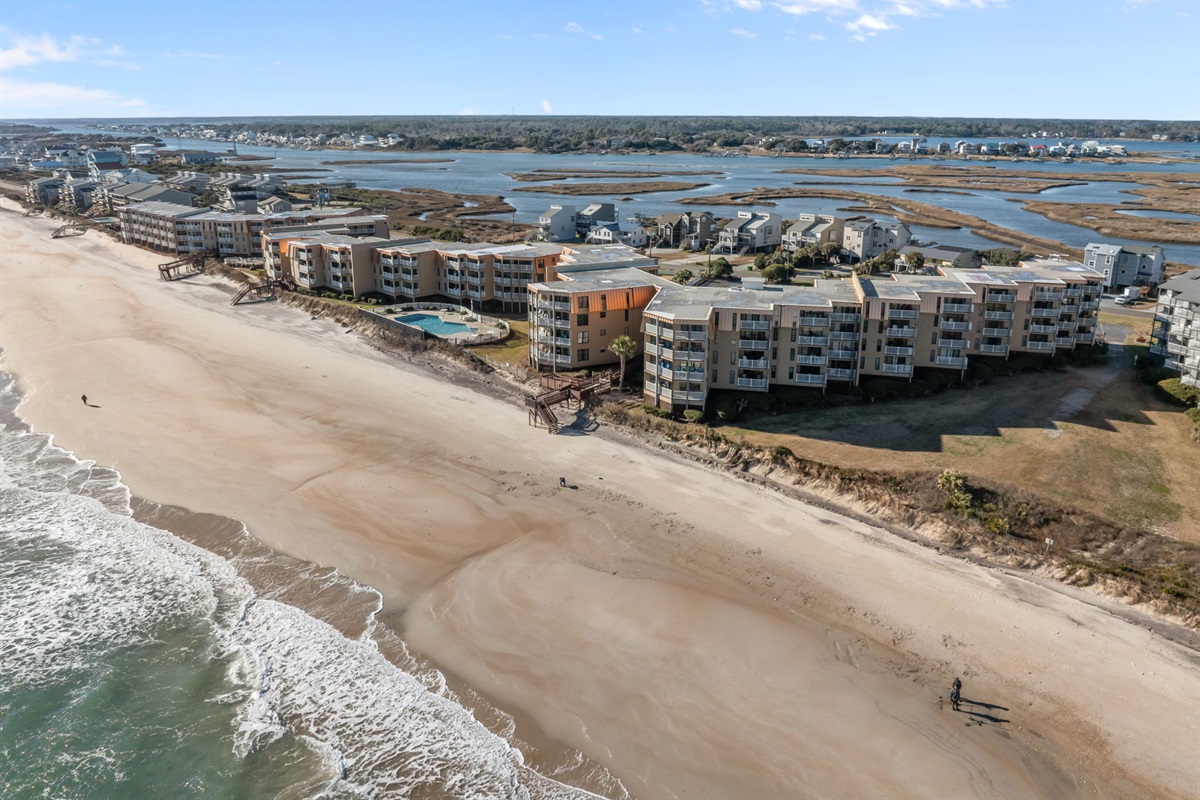 Wake up to wide-open ocean views with Topsail Dunes stretching along a quiet shoreline and direct access to a peaceful, uncrowded beach.