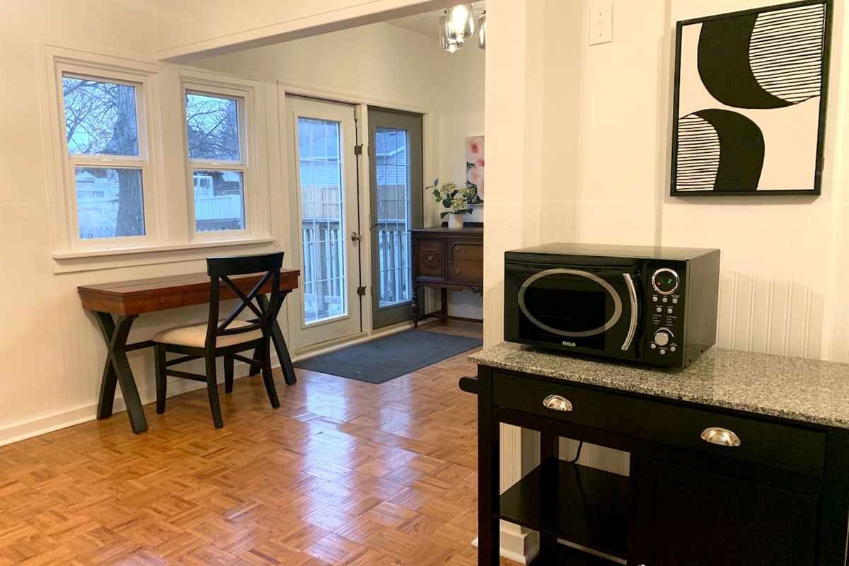 A table and chair that works well as a desk. The table expands to allow a larger workspace, if needed. 