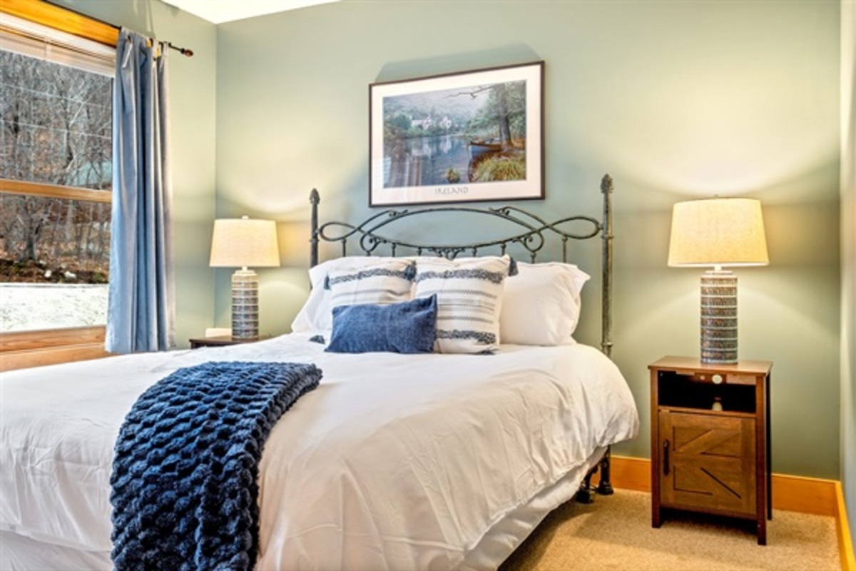 Wake refreshed in a tranquil bedroom where soft light and simple comfort start the day right.