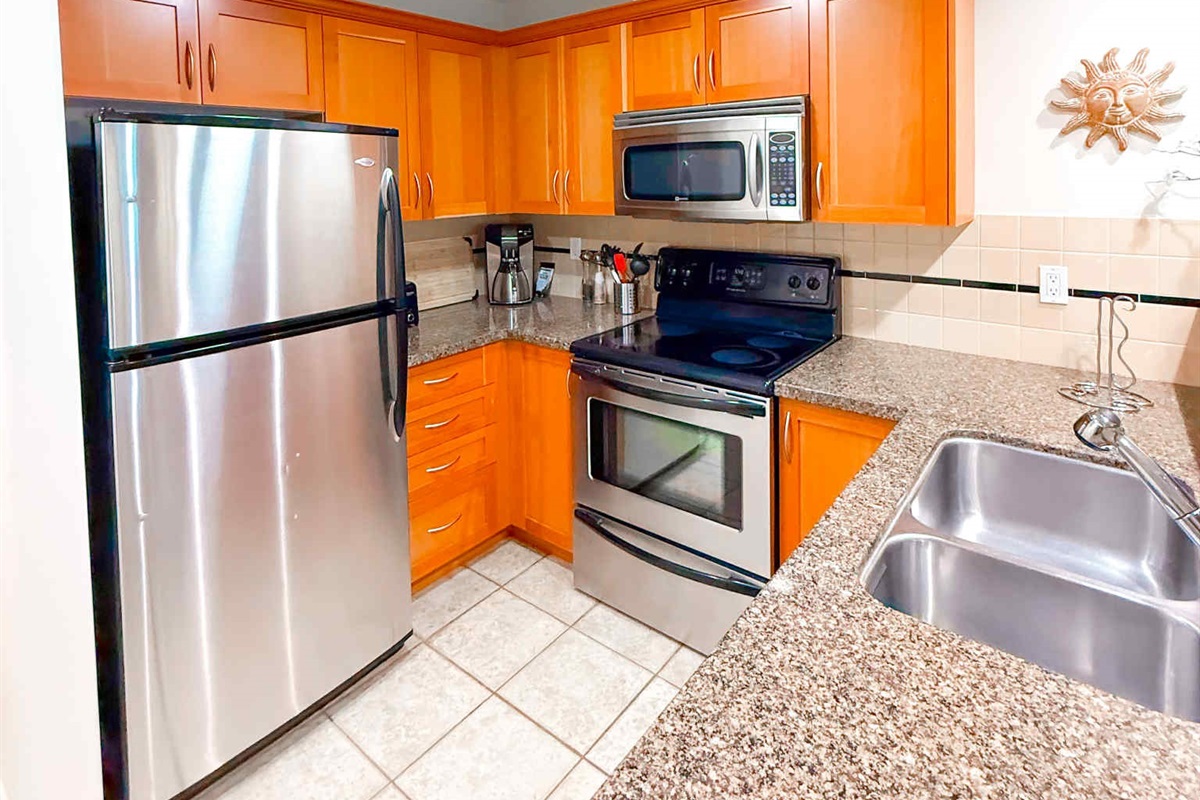 Unit A - So much counterspace! Fridge, Stove, microwave and dishwasher.