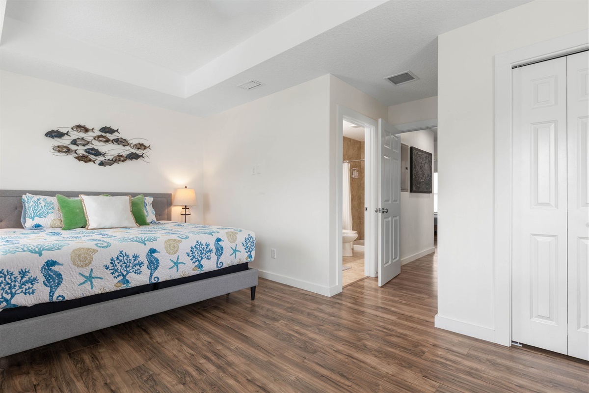 Spacious bedrooms give everyone room to spread out and unwind after a beach day.
