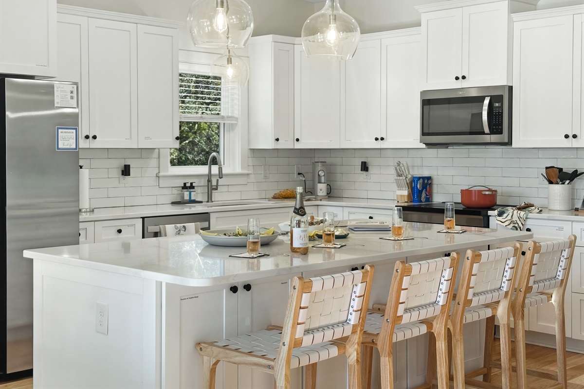 The kitchen comes fully stocked with an induction cooktop.