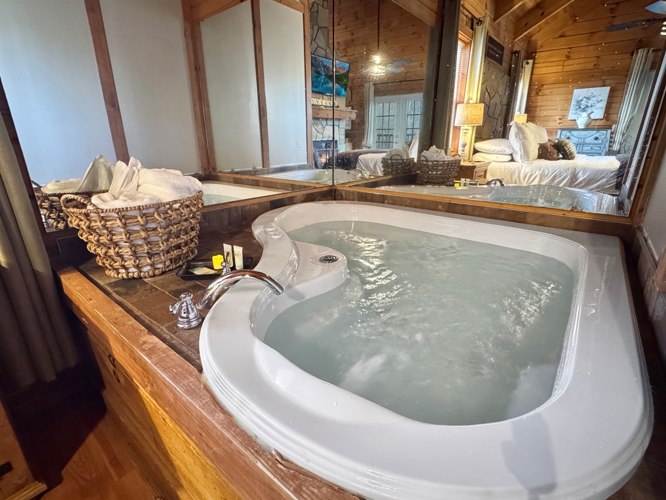 End the day soaking together in warm, bubbling water — candles lit, stress gone