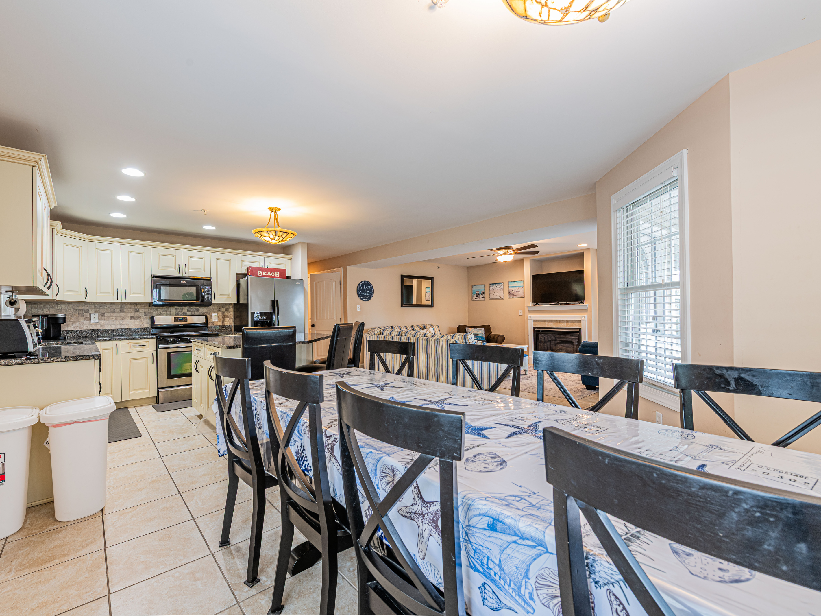 Wide View of Open Main Living, Kitchen, and Dining Spaces