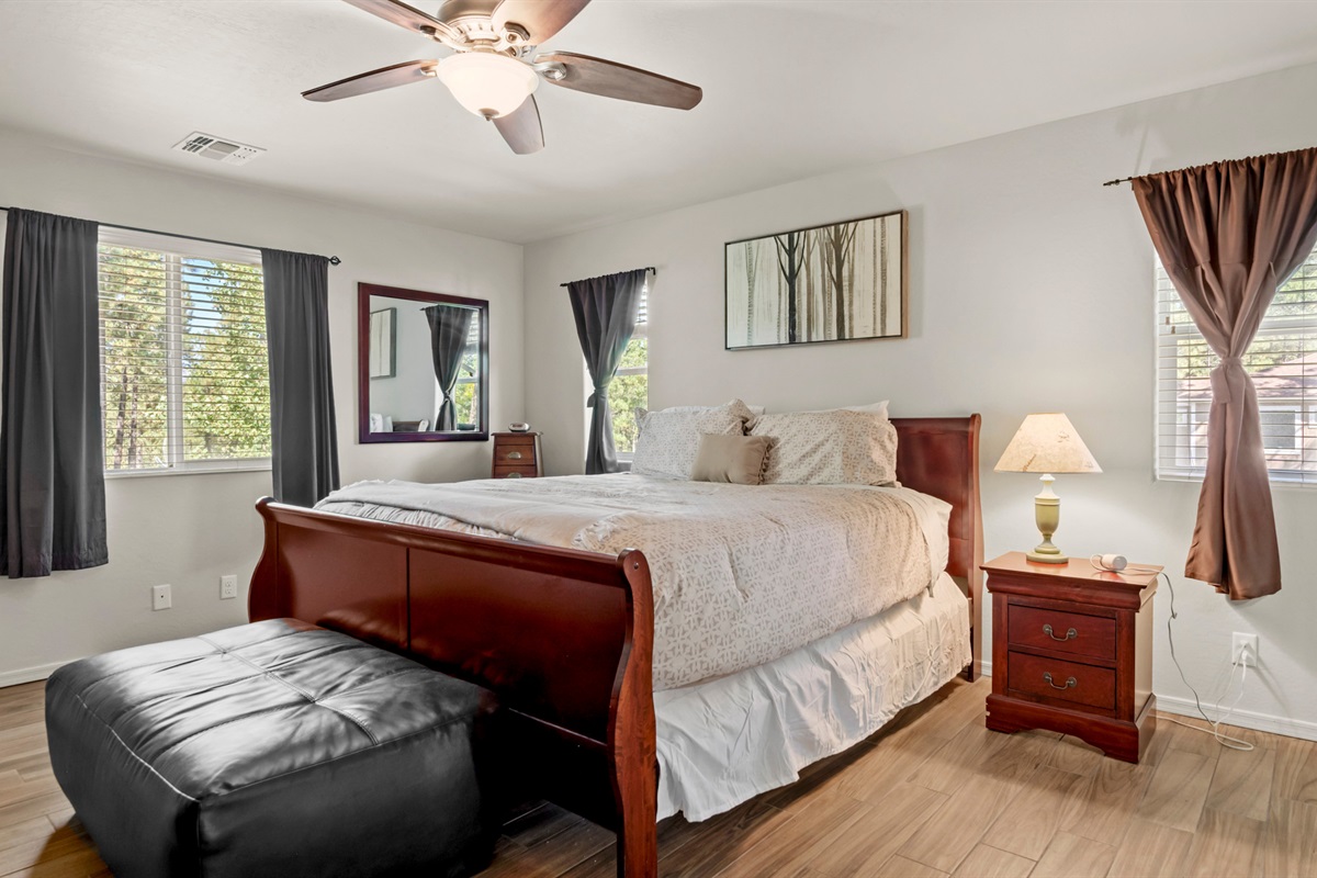 Unwind in the master bedroom, where a king bed and en-suite bathroom create a private sanctuary.