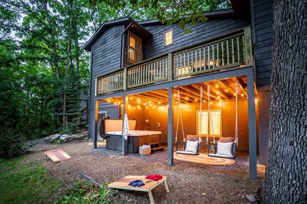 Cornhole, swings, and hot tub available for your entertainment. 