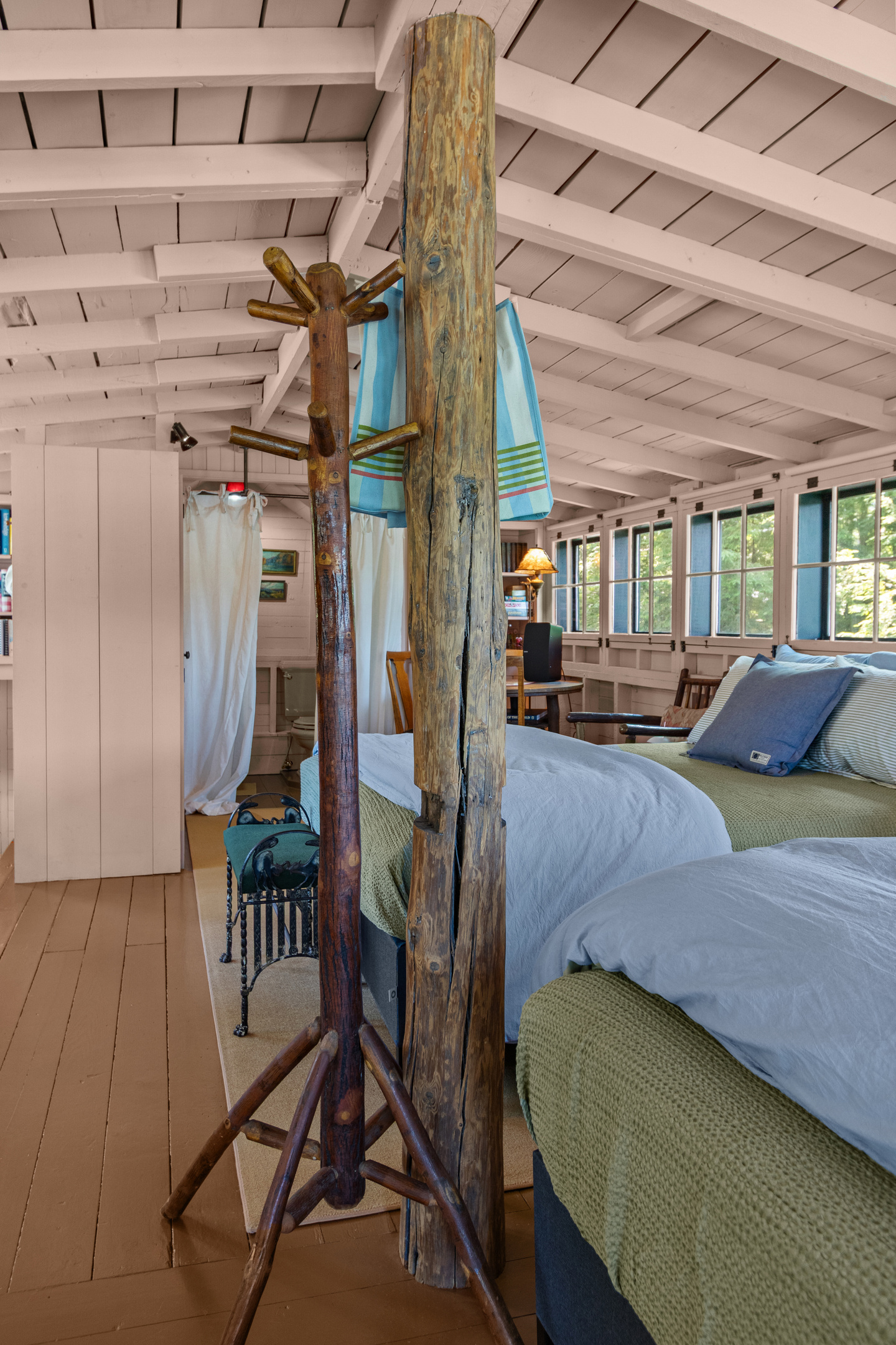 Thoughtful storage makes settling in easy—hang your bags, jackets, and gear on the decorative tree rack.