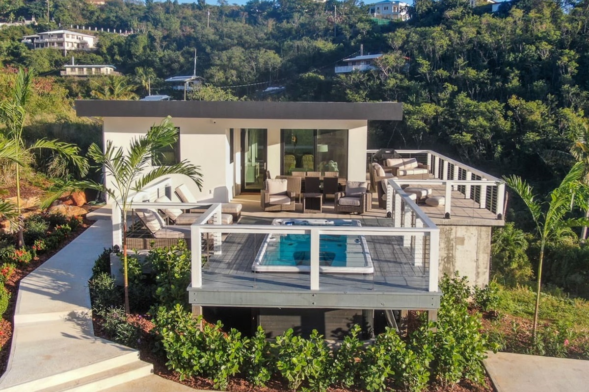 Stunning villa nestled in tropical greenery, offering privacy and tranquility.