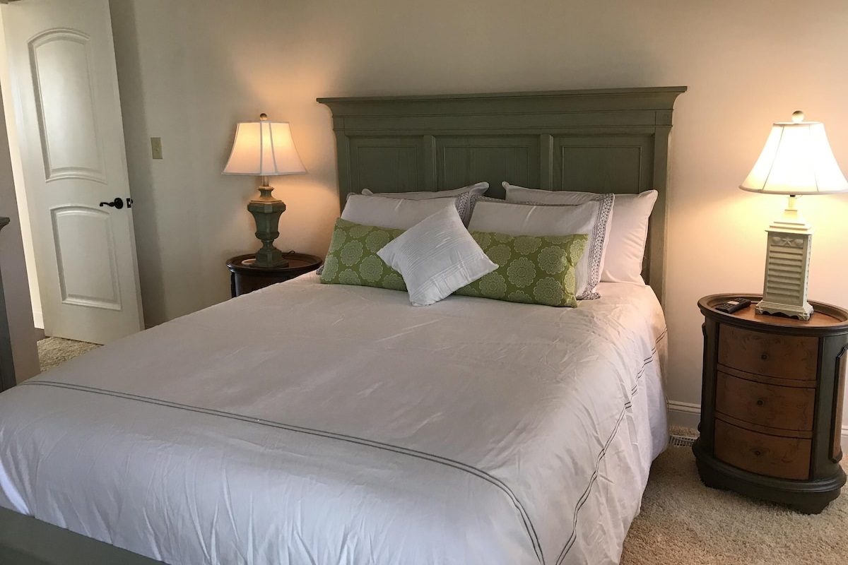 Jr. Master w/ Queen bed, attached full bath, TV, balcony