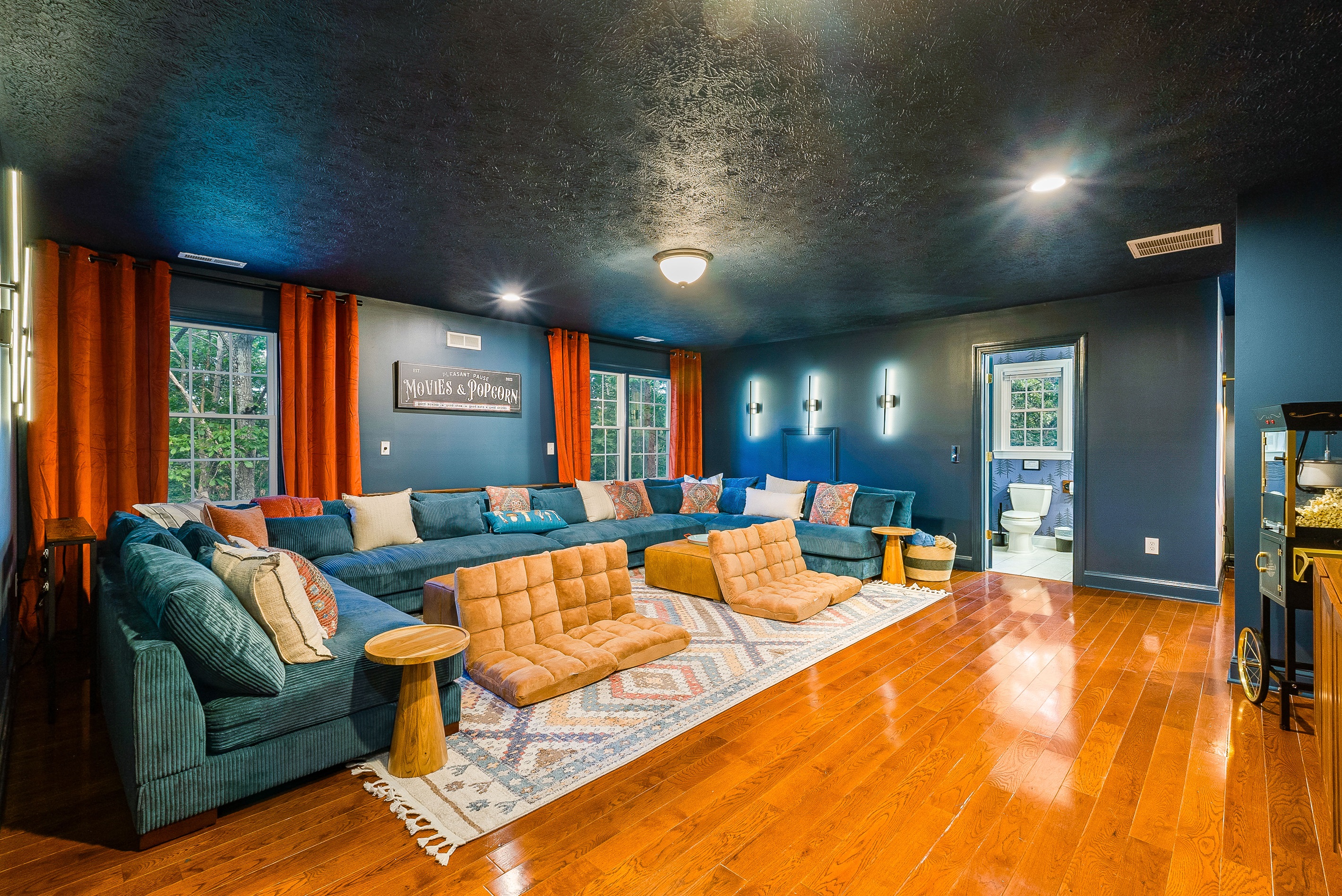 With plenty of space for everyone, this media room is perfect for cozy nights in.
