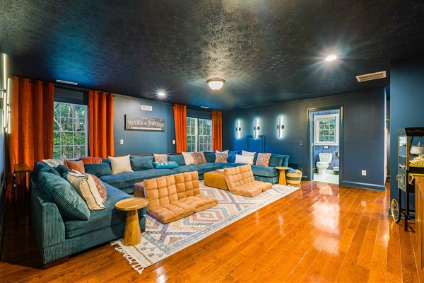 With plenty of space for everyone, this media room is perfect for cozy nights in.