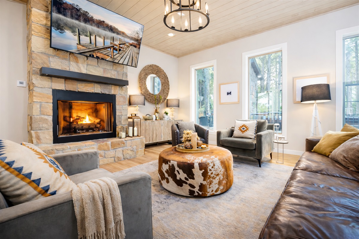 The living room was meticulously arranged by a local interior designer and features all locally-sourced pieces that come together to make a cozy, beautiful living room experience.