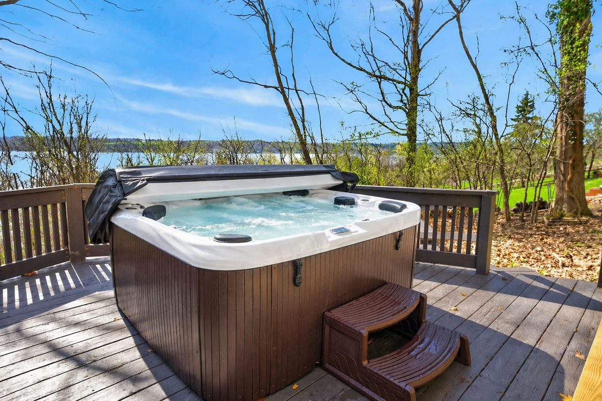 Relax in your private hot tub with beautiful Canandaigua Lake views—soak in warm bubbling water surrounded by nature, fresh air, and peaceful scenery, perfect for unwinding after a day of exploring or enjoying a quiet morning retreat