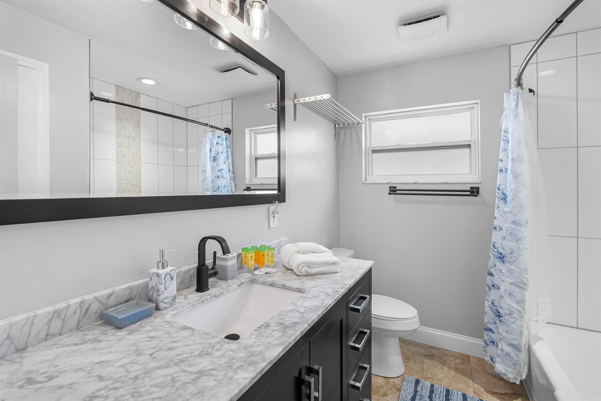 Clean, bright, and comfortable—this full bath offers plenty of counter space, and a peaceful atmosphere.