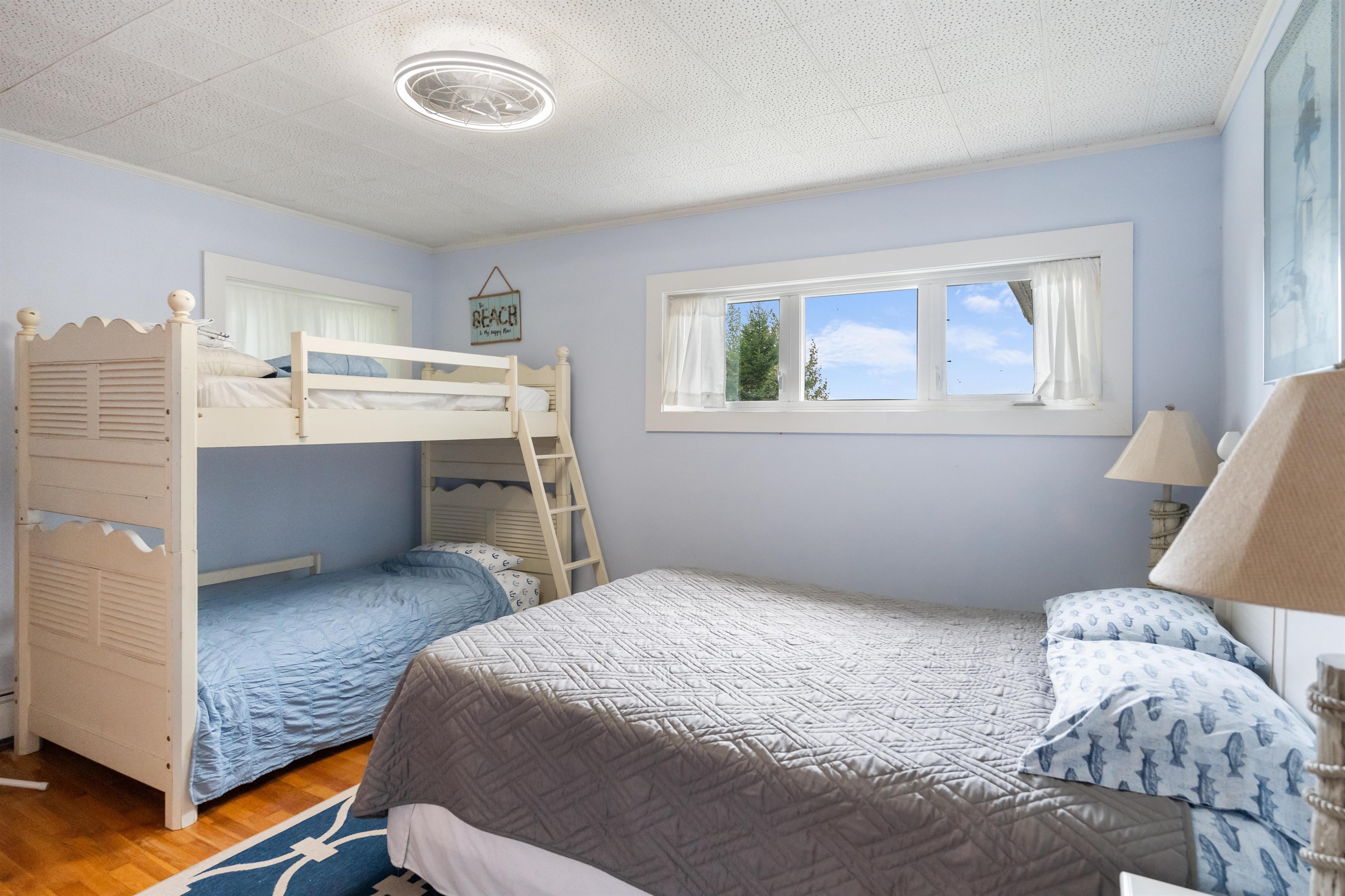 Bedroom 2 queen sized bed with a great view of the beach and lake