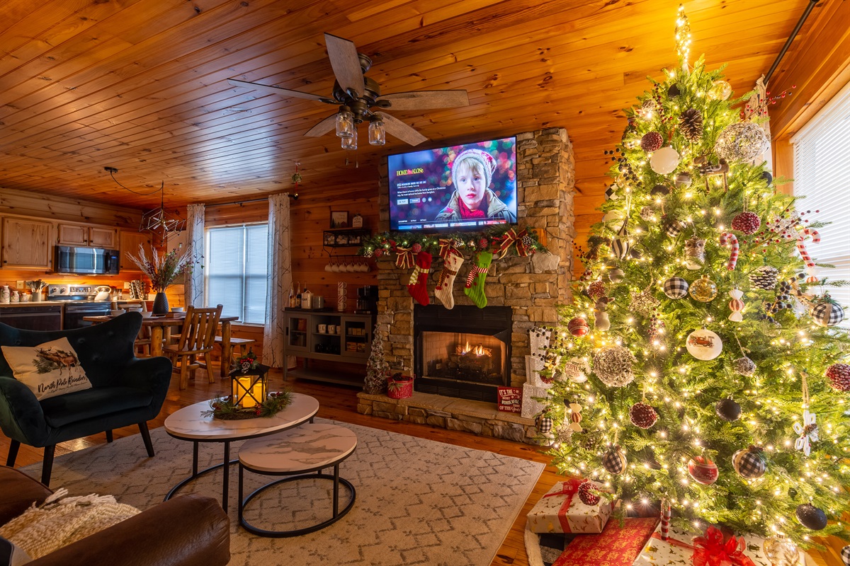 Sip some hot cocoa and enjoy the Christmas decorations by the fireplace