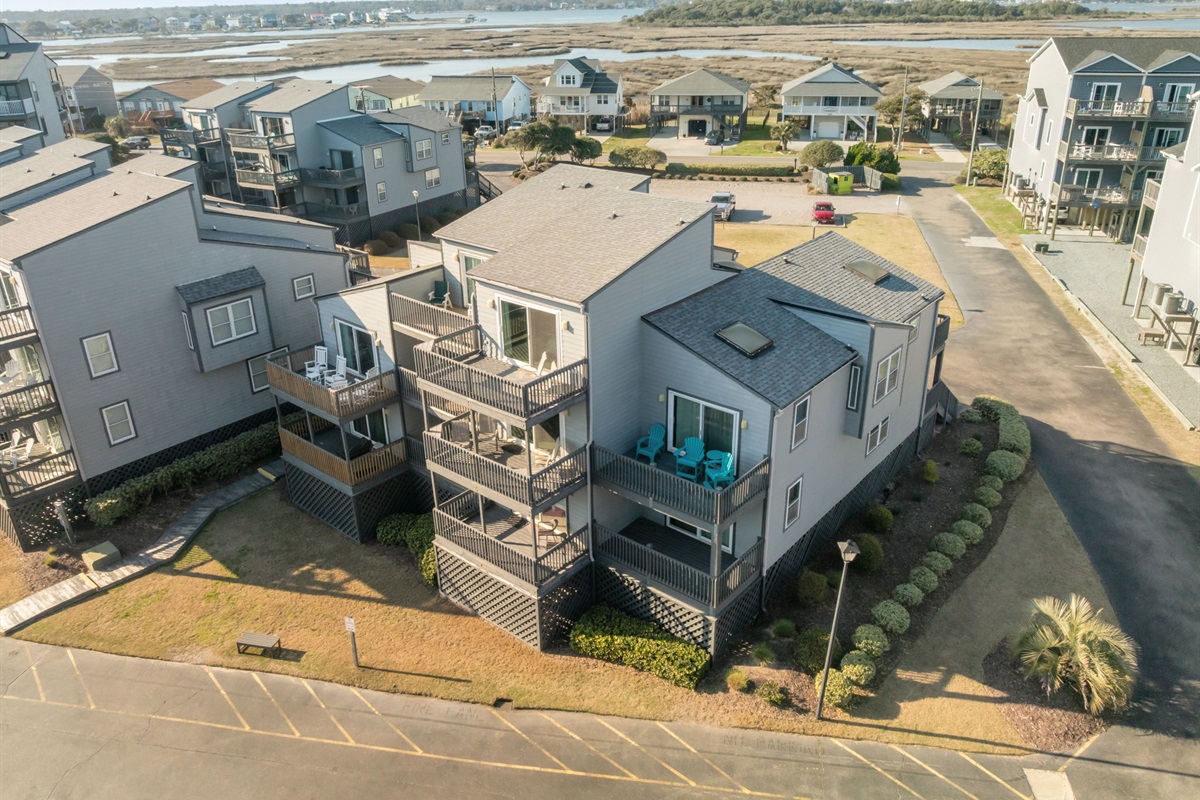 Aerial view of the North Topsail Beach neighborhood with nearby marsh views and coastal surroundings