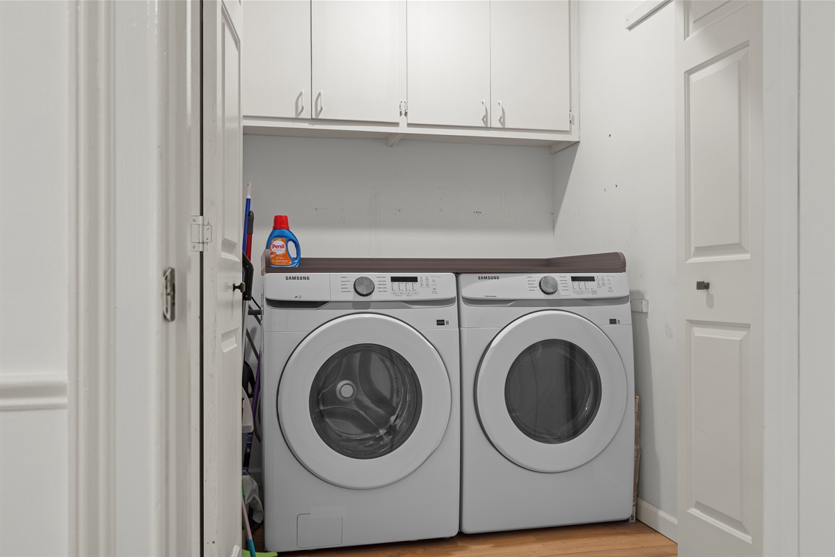 Laundry Room: Convenient appliances and storage to keep your vacation hassle-free and fresh!