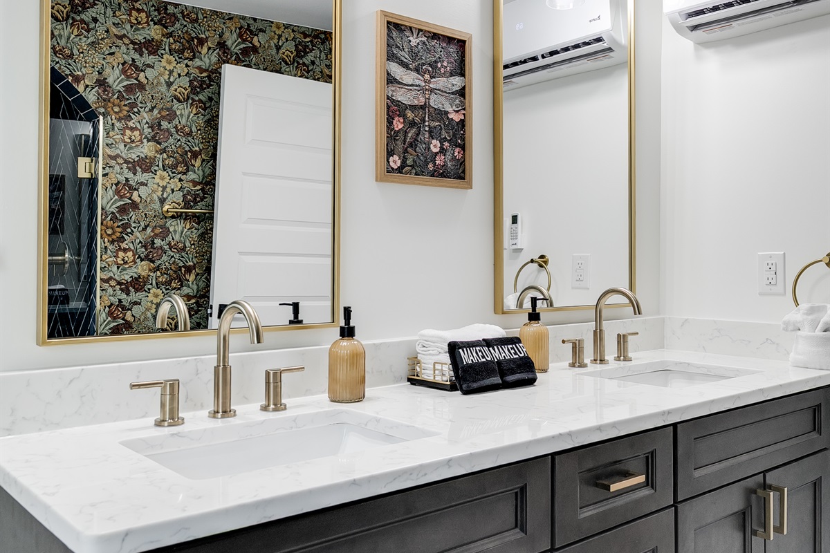 Spa-like Retreat: Dual sinks and elegant decor create a relaxing atmosphere for your getaway!