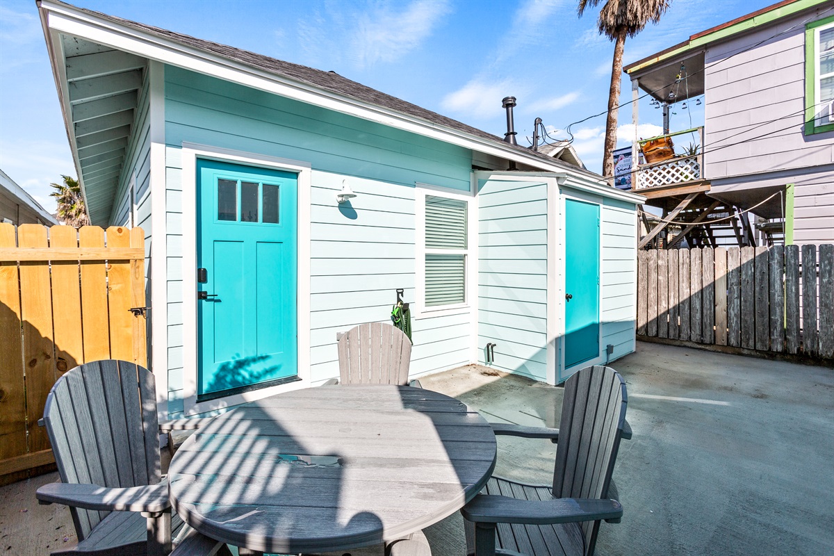 Patio table for four.  Enjoy dinner outside with the sound of the waves!