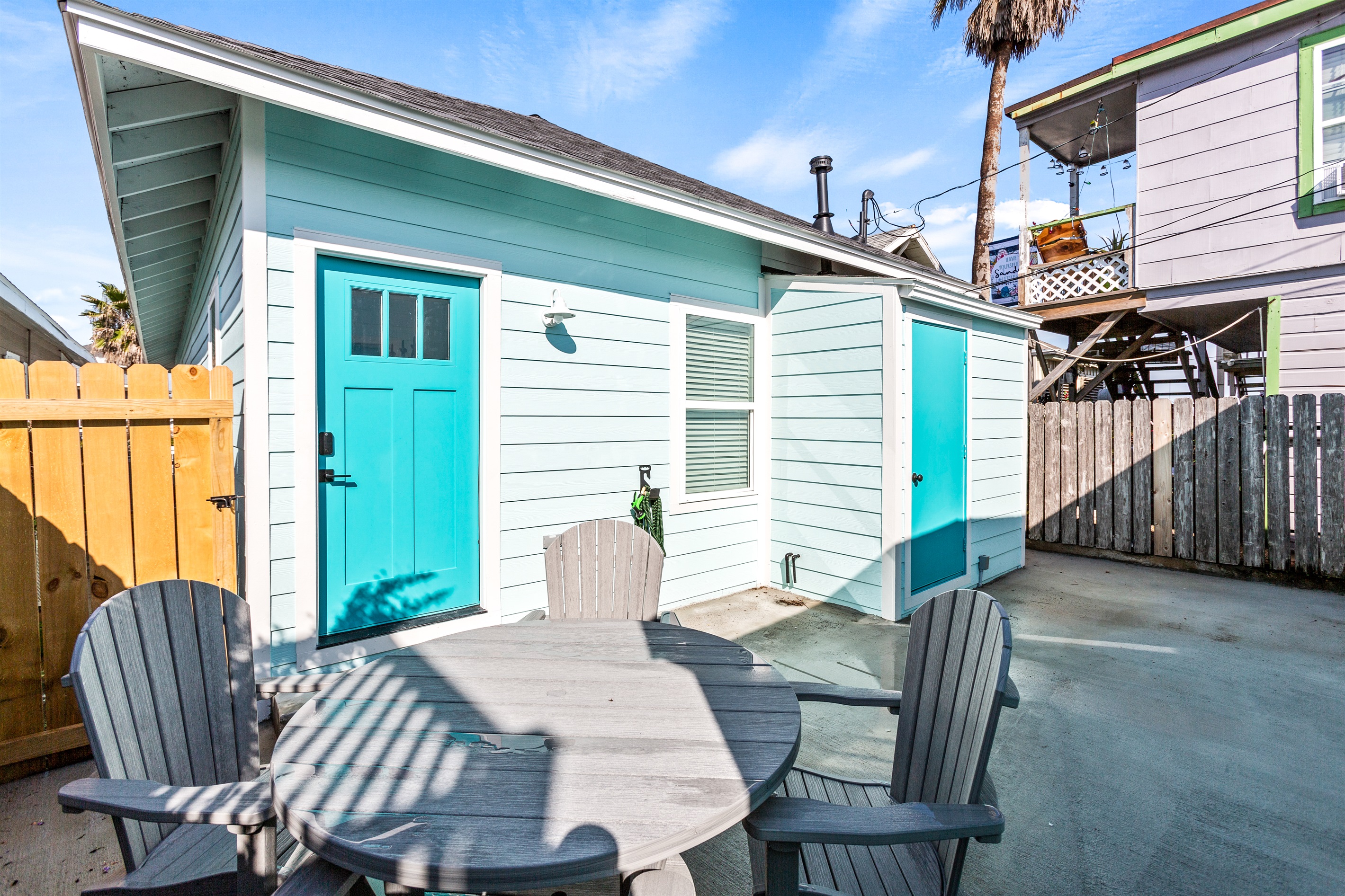 Patio table for four.  Enjoy dinner outside with the sound of the waves!