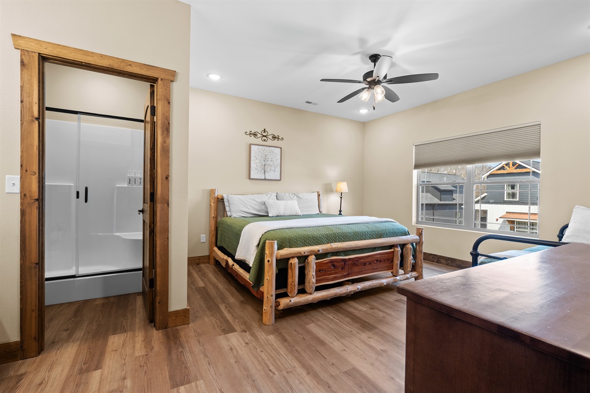 Upper level king bedroom with twin bed. En suite shower 