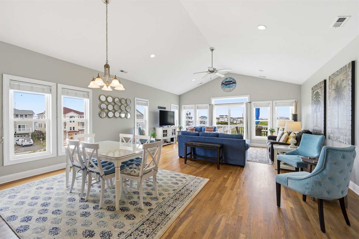 Airy layout connecting living, dining, and kitchen spaces